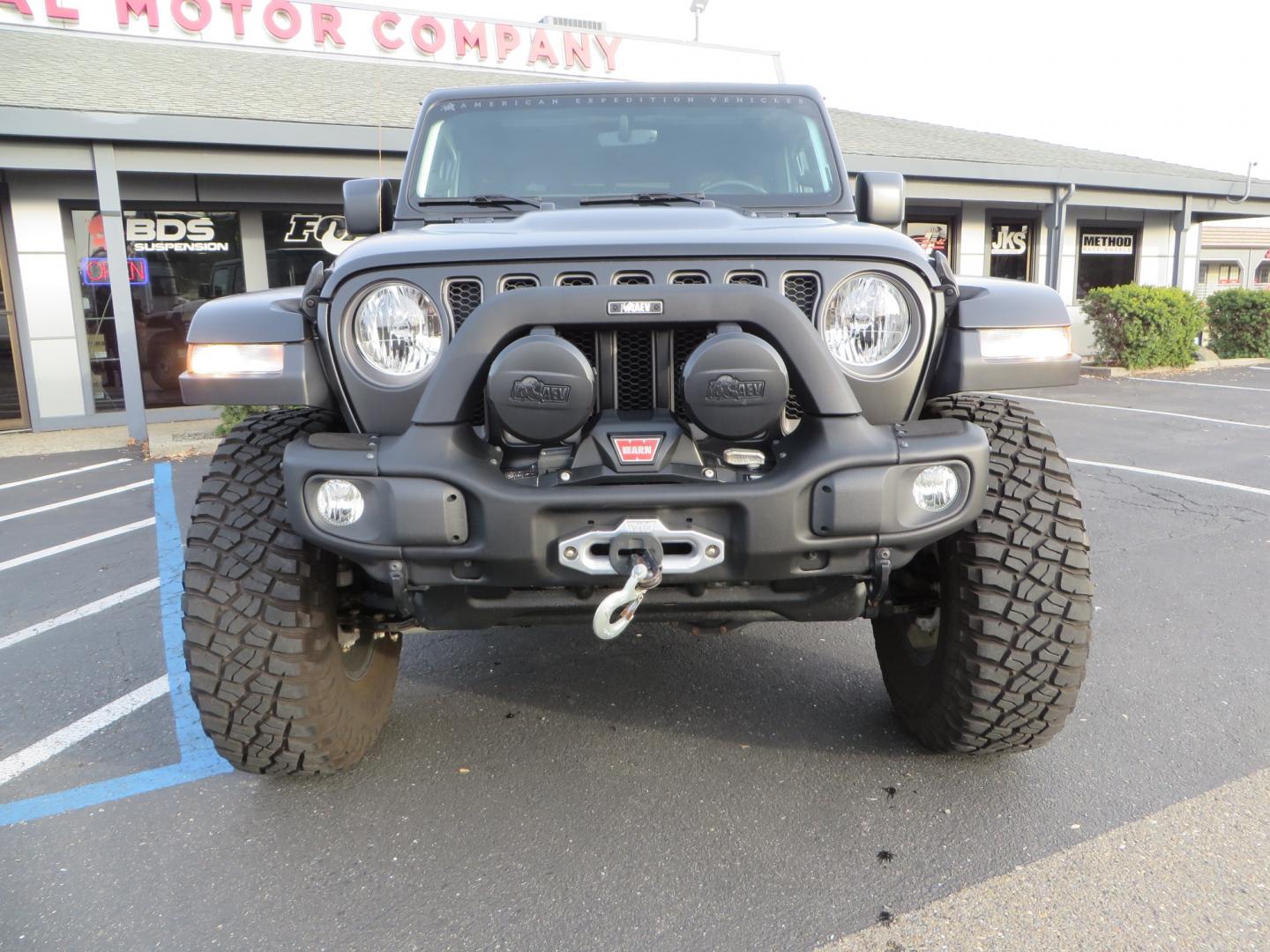 2020 BLACK /BLACK Jeep Wrangler Unlimited Rubicon (1C4HJXFGXLW) with an 3.6L V6 DOHC 24V FFV engine, 6A transmission, located at 2630 Grass Valley Highway, Auburn, CA, 95603, (530) 508-5100, 38.937893, -121.095482 - STANDARD CONTENT AEV RX Front Bumper AEV Front Skid Plate AEV Non-Winch Cover Plate AEV 7000 Series Lights AEV Light Cover Kit AEV 2.5" DualSport RT Suspension System AEV Front Geometry Correction Brackets AEV Steering Stabilizer AEV Rear Bumper AEV Swing-Out Tire Carrier AEV CHMSL Mount - Photo#1